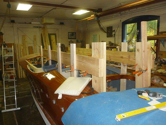 We'll have to turn the boat over, so we're building framing on which the boat will rest