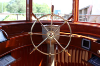 We found an era correct helm station, the trick was incorporating a modern steering system