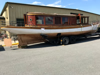 The beginning, August 2018, at the annual Antique Boat Museum auction