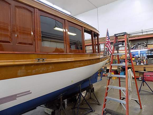 cabin windows drop down into the hull