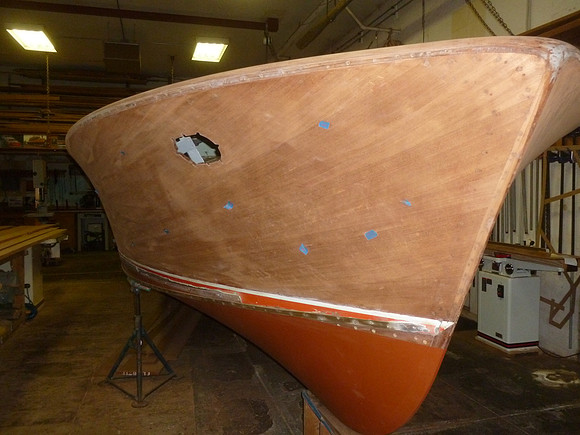 Blue tape specks identify areas for repair