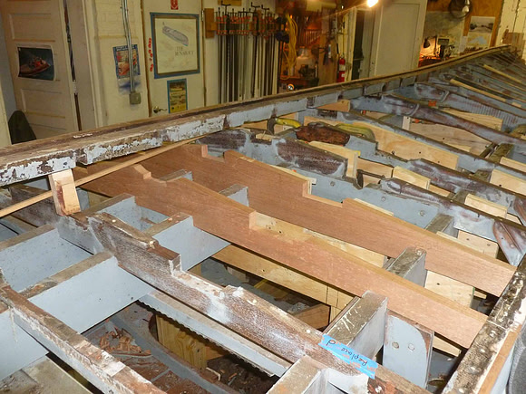 With old keel, upper left, out, new transverse frames are fit