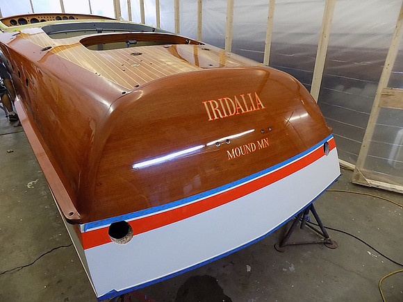 Final varnish coats, after gold-leaf transom name